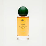 Perfume bottle with green cap on a white background