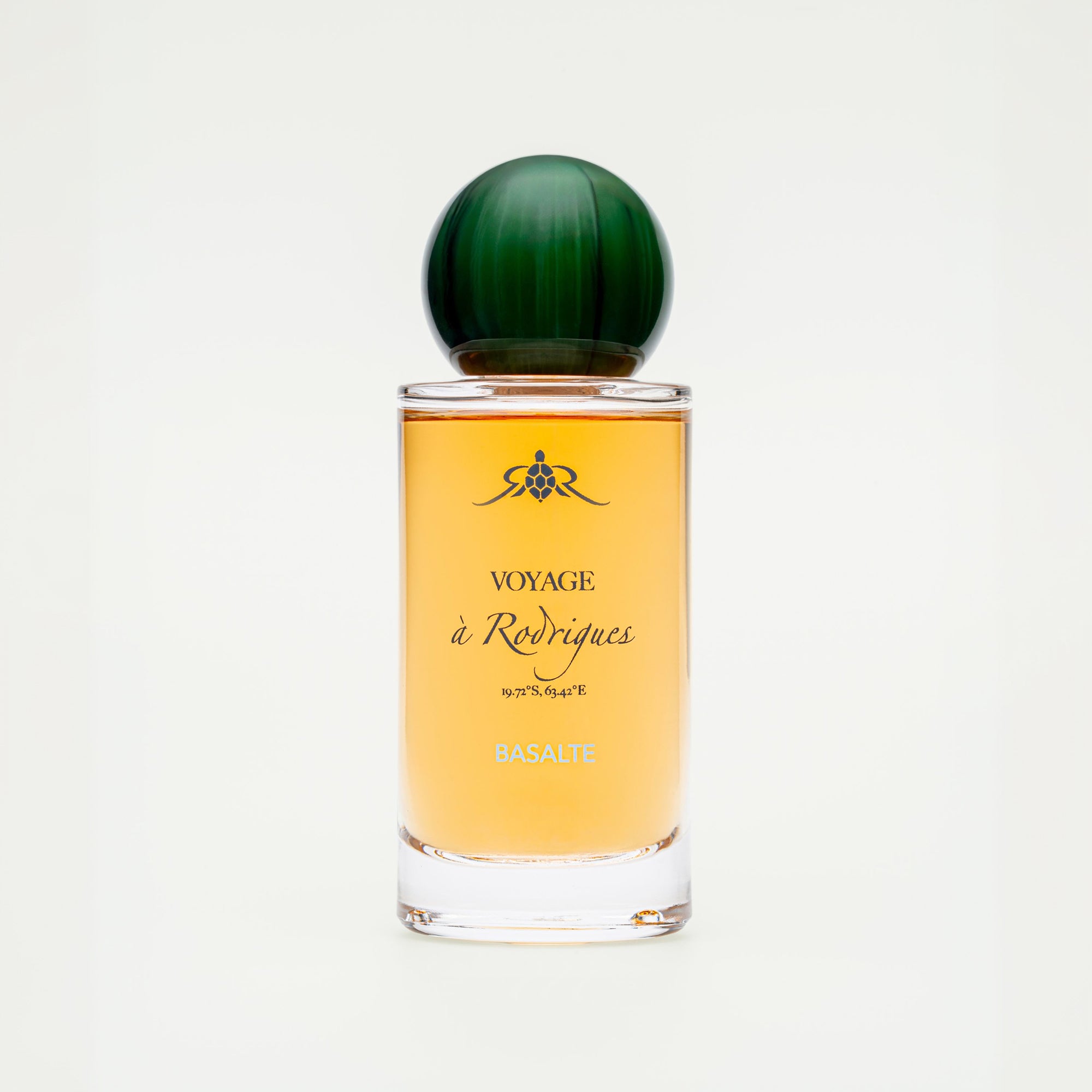 Perfume bottle with green cap on a white background