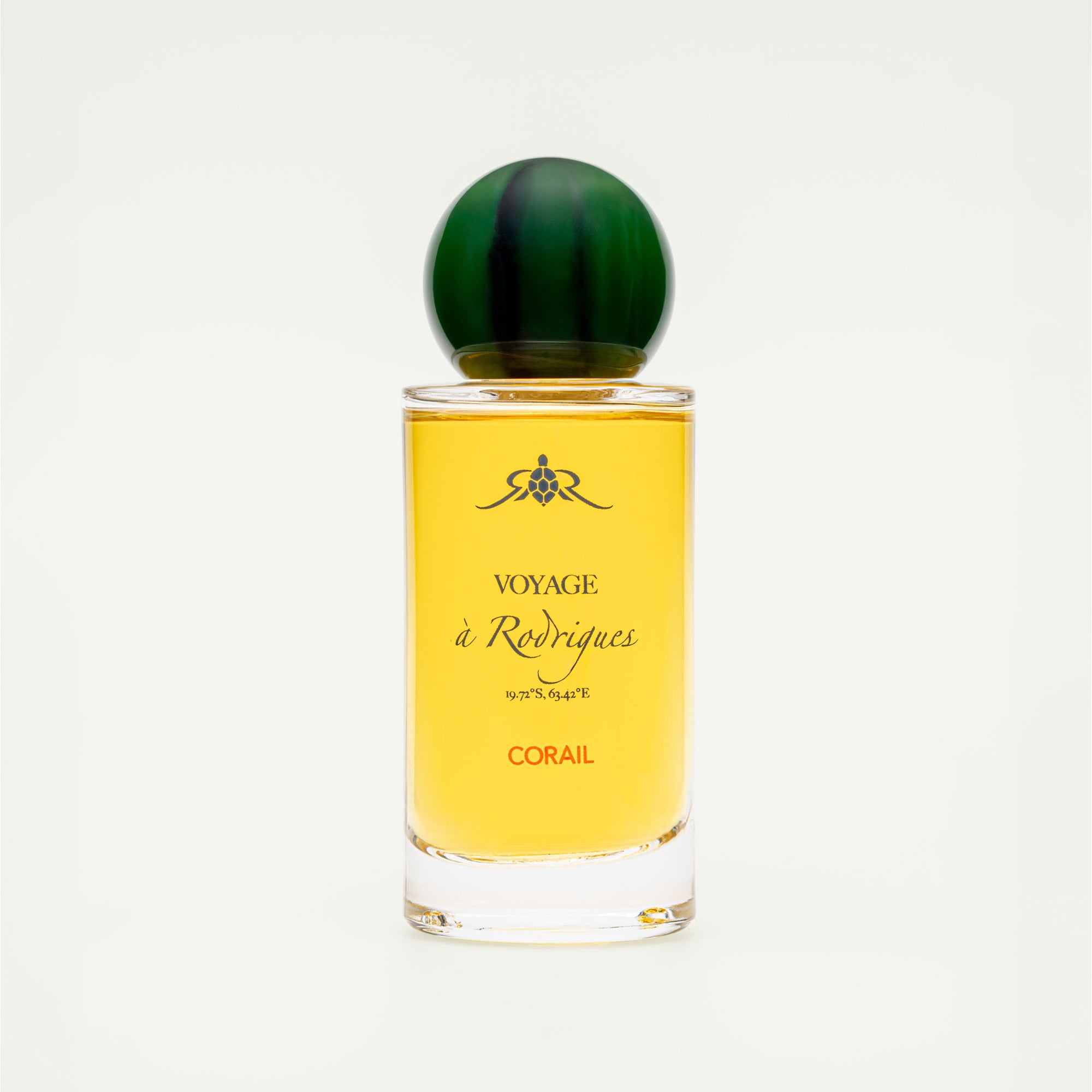 Perfume bottle with yellow label and green cap on a white background