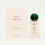 Perfume bottle and packaging of 'Voyage a Rodriques' on a white background