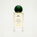 Perfume bottle labeled 'Voyage a Rodrigues The Island' on a white background