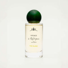 The Island eau de parfum by Voyage à Rodrigues, standalone bottle shot with green cap on, on a cream background